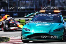 Max Verstappen (NLD) Red Bull Racing RB18 leads behind the Aston Martin FIA Safety Car. 19.06.2022. Formula 1 World Championship, Rd 9, Canadian Grand Prix, Montreal, Canada, Race Day.