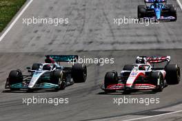 George Russell (GBR) Mercedes AMG F1 W13 and Kevin Magnussen (DEN) Haas VF-22 battle for position. 19.06.2022. Formula 1 World Championship, Rd 9, Canadian Grand Prix, Montreal, Canada, Race Day.