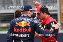 Max Verstappen (NLD) Red Bull Racing RB18 and Carlos Sainz Jr (ESP) Ferrari F1-75. 18.06.2022. Formula 1 World Championship, Rd 9, Canadian Grand Prix, Montreal, Canada, Qualifying Day.