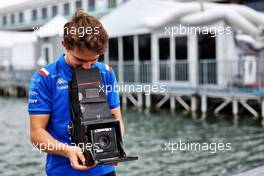 Oscar Piastri (AUS) Alpine F1 Team Reserve Driver with the vintage camera used by Joshua Paul, Photographer. 16.06.2022. Formula 1 World Championship, Rd 9, Canadian Grand Prix, Montreal, Canada, Preparation Day.