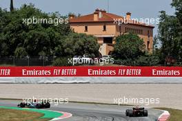Lewis Hamilton (GBR) Mercedes AMG F1 W13 leads Juri Vips (EST) Red Bull Racing RB18 Test Driver. 20.05.2022 Formula 1 World Championship, Rd 6, Spanish Grand Prix, Barcelona, Spain, Practice Day.