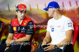 (L to R): Charles Leclerc (MON) Ferrari and Mick Schumacher (GER) Haas F1 Team in the FIA Press Conference. 20.05.2022 Formula 1 World Championship, Rd 6, Spanish Grand Prix, Barcelona, Spain, Practice Day.