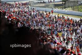 Circuit atmosphere - fans invade the circuit to head to the podium at the end of the race. 22.05.2022. Formula 1 World Championship, Rd 6, Spanish Grand Prix, Barcelona, Spain, Race Day.