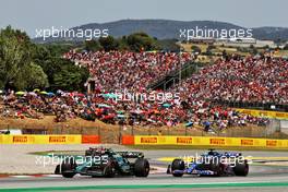Sebastian Vettel (GER) Aston Martin F1 Team AMR22 and Fernando Alonso (ESP) Alpine F1 Team A522 battle for position. 22.05.2022. Formula 1 World Championship, Rd 6, Spanish Grand Prix, Barcelona, Spain, Race Day.