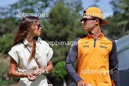 (L to R): Luisinha Oliveira (POR) with her boyfriend Lando Norris (GBR) McLaren. 21.05.2022. Formula 1 World Championship, Rd 6, Spanish Grand Prix, Barcelona, Spain, Qualifying Day.