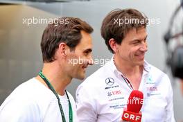 (L to R): Roger Federer (SUI) Tennis Player with Toto Wolff (GER) Mercedes AMG F1 Shareholder and Executive Director. 21.05.2022. Formula 1 World Championship, Rd 6, Spanish Grand Prix, Barcelona, Spain, Qualifying Day.