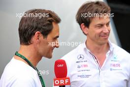 (L to R): Roger Federer (SUI) Tennis Player with Toto Wolff (GER) Mercedes AMG F1 Shareholder and Executive Director. 21.05.2022. Formula 1 World Championship, Rd 6, Spanish Grand Prix, Barcelona, Spain, Qualifying Day.