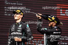 (L to R): George Russell (GBR) Mercedes AMG F1 celebrates his third position on the podium. 24.07.2022. Formula 1 World Championship, Rd 12, French Grand Prix, Paul Ricard, France, Race Day.
