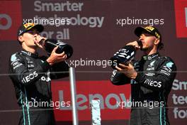 (L to R): George Russell (GBR) Mercedes AMG F1 celebrates his third position on the podium with second placed team mate Lewis Hamilton (GBR) Mercedes AMG F1. 24.07.2022. Formula 1 World Championship, Rd 12, French Grand Prix, Paul Ricard, France, Race Day.