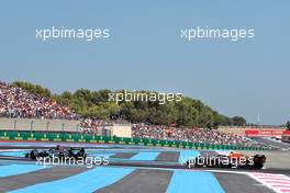 George Russell (GBR) Mercedes AMG F1 W13 leads Sergio Perez (MEX) Red Bull Racing RB18. 24.07.2022. Formula 1 World Championship, Rd 12, French Grand Prix, Paul Ricard, France, Race Day.