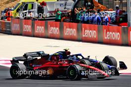 Carlos Sainz Jr (ESP) Ferrari F1-75 and Nicholas Latifi (CDN) Williams Racing FW44 battle for position. 24.07.2022. Formula 1 World Championship, Rd 12, French Grand Prix, Paul Ricard, France, Race Day.