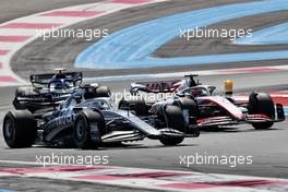 Pierre Gasly (FRA) AlphaTauri AT03 and Kevin Magnussen (DEN) Haas VF-22. 24.07.2022. Formula 1 World Championship, Rd 12, French Grand Prix, Paul Ricard, France, Race Day.