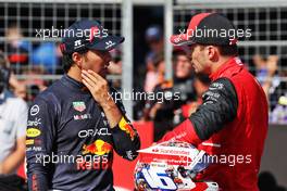 (L to R): Sergio Perez (MEX) Red Bull Racing with pole sitter Charles Leclerc (MON) Ferrari in qualifying parc ferme. 23.07.2022. Formula 1 World Championship, Rd 12, French Grand Prix, Paul Ricard, France, Qualifying Day.