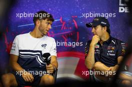 (L to R): Pierre Gasly (FRA) AlphaTauri and Sergio Perez (MEX) Red Bull Racing in the FIA Press Conference. 21.07.2022. Formula 1 World Championship, Rd 12, French Grand Prix, Paul Ricard, France, Preparation Day.