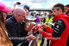 Charles Leclerc (MON) Ferrari signs autographs for the fans. 01.07.2022. Formula 1 World Championship, Rd 10, British Grand Prix, Silverstone, England, Practice Day.