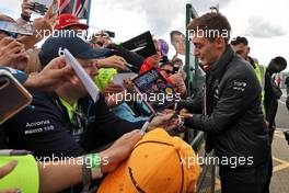 George Russell (GBR) Mercedes AMG F1 signs autographs for the fans. 01.07.2022. Formula 1 World Championship, Rd 10, British Grand Prix, Silverstone, England, Practice Day.