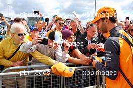 Daniel Ricciardo (AUS) McLaren signs autographs for the fans. 01.07.2022. Formula 1 World Championship, Rd 10, British Grand Prix, Silverstone, England, Practice Day.
