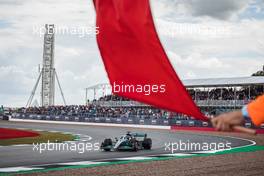 George Russell (GBR) Mercedes AMG F1 W13 passes a red flag. 01.07.2022. Formula 1 World Championship, Rd 10, British Grand Prix, Silverstone, England, Practice Day.