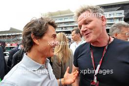 (L to R): Tom Cruise (USA) Actor with Gordon Ramsey (GBR) Celebrity Chef on the grid. 03.07.2022. Formula 1 World Championship, Rd 10, British Grand Prix, Silverstone, England, Race Day.