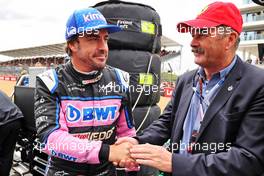 (L to R): Fernando Alonso (ESP) Alpine F1 Team with Nigel Mansell (GBR) on the grid. 03.07.2022. Formula 1 World Championship, Rd 10, British Grand Prix, Silverstone, England, Race Day.