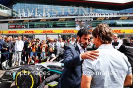 (L to R): Mohammed Bin Sulayem (UAE) FIA President with Tom Cruise (USA) Actor on the grid. 03.07.2022. Formula 1 World Championship, Rd 10, British Grand Prix, Silverstone, England, Race Day.