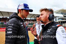 (L to R): Esteban Ocon (FRA) Alpine F1 Team with Josh Peckett (GBR) Alpine F1 Team Race Engineer on the grid. 03.07.2022. Formula 1 World Championship, Rd 10, British Grand Prix, Silverstone, England, Race Day.