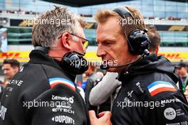 (L to R): Otmar Szafnauer (USA) Alpine F1 Team, Team Principal with Laurent Rossi (FRA) Alpine Chief Executive Officer on the grid. 03.07.2022. Formula 1 World Championship, Rd 10, British Grand Prix, Silverstone, England, Race Day.