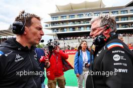 (L to R): Laurent Rossi (FRA) Alpine Chief Executive Officer with Otmar Szafnauer (USA) Alpine F1 Team, Team Principal on the grid. 03.07.2022. Formula 1 World Championship, Rd 10, British Grand Prix, Silverstone, England, Race Day.