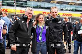 (L to R): Otmar Szafnauer (USA) Alpine F1 Team, Team Principal with Abbi Pulling (GBR) Racing X and Laurent Rossi (FRA) Alpine Chief Executive Officer on the grid. 03.07.2022. Formula 1 World Championship, Rd 10, British Grand Prix, Silverstone, England, Race Day.