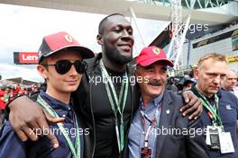 Stormzy (GBR) Rapper (Centre) on the grid with Nigel Mansell (GBR) (Right) and his grandson (Left). 03.07.2022. Formula 1 World Championship, Rd 10, British Grand Prix, Silverstone, England, Race Day.