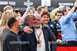 (L to R): Anthony Hamilton (GBR) with Antonio Perez (MEX) and Tom Cruise (USA) Actor in parc ferme. 03.07.2022. Formula 1 World Championship, Rd 10, British Grand Prix, Silverstone, England, Race Day.