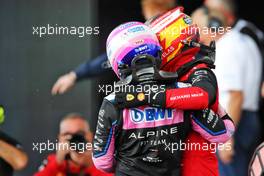Race winner Carlos Sainz Jr (ESP) Ferrari celebrates in parc ferme with Fernando Alonso (ESP) Alpine F1 Team. 03.07.2022. Formula 1 World Championship, Rd 10, British Grand Prix, Silverstone, England, Race Day.
