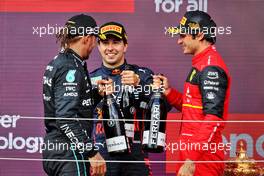 The podium (L to R): Lewis Hamilton (GBR) Mercedes AMG F1, third; Sergio Perez (MEX) Red Bull Racing, second; Carlos Sainz Jr (ESP) Ferrari, race winner. 03.07.2022. Formula 1 World Championship, Rd 10, British Grand Prix, Silverstone, England, Race Day.