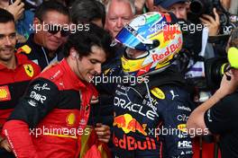 1st place Carlos Sainz Jr (ESP) Ferrari F1-75 and Sergio Perez (MEX) Red Bull Racing RB18. 03.07.2022. Formula 1 World Championship, Rd 10, British Grand Prix, Silverstone, England, Race Day.