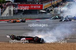 Guanyu Zhou (CHN) Alfa Romeo F1 Team C42 crashes at the start of the race. 03.07.2022. Formula 1 World Championship, Rd 10, British Grand Prix, Silverstone, England, Race Day.