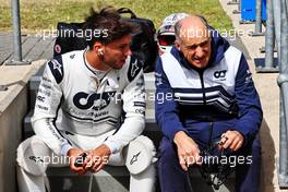 (L to R): Pierre Gasly (FRA) AlphaTauri with Franz Tost (AUT) AlphaTauri Team Principal. 03.07.2022. Formula 1 World Championship, Rd 10, British Grand Prix, Silverstone, England, Race Day.