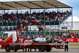 The Mercedes AMG F1 W13 of George Russell (GBR) Mercedes AMG F1 is recovered back to the pits on the back of a truck. 03.07.2022. Formula 1 World Championship, Rd 10, British Grand Prix, Silverstone, England, Race Day.