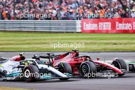 Lewis Hamilton (GBR) Mercedes AMG F1 W13 and Charles Leclerc (MON) Ferrari F1-75 battle for position. 03.07.2022. Formula 1 World Championship, Rd 10, British Grand Prix, Silverstone, England, Race Day.