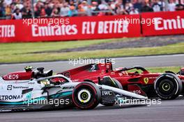 Lewis Hamilton (GBR) Mercedes AMG F1 W13 and Charles Leclerc (MON) Ferrari F1-75 battle for position. 03.07.2022. Formula 1 World Championship, Rd 10, British Grand Prix, Silverstone, England, Race Day.