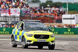 Police on the circuit at the start of the race as an incident involving people attempting to enter the circuit. 03.07.2022. Formula 1 World Championship, Rd 10, British Grand Prix, Silverstone, England, Race Day.