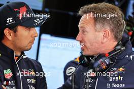 (L to R): Sergio Perez (MEX) Red Bull Racing and Christian Horner (GBR) Red Bull Racing Team Principal. 02.07.2022. Formula 1 World Championship, Rd 10, British Grand Prix, Silverstone, England, Qualifying Day.