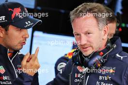 (L to R): Sergio Perez (MEX) Red Bull Racing and Christian Horner (GBR) Red Bull Racing Team Principal. 02.07.2022. Formula 1 World Championship, Rd 10, British Grand Prix, Silverstone, England, Qualifying Day.