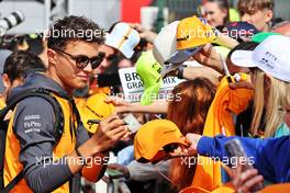 Lando Norris (GBR) McLaren with fans. 03.07.2022. Formula 1 World Championship, Rd 10, British Grand Prix, Silverstone, England, Race Day.