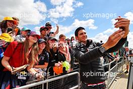 Esteban Ocon (FRA) Alpine F1 Team with fans. 03.07.2022. Formula 1 World Championship, Rd 10, British Grand Prix, Silverstone, England, Race Day.