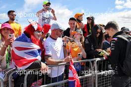 Oscar Piastri (AUS) Alpine F1 Team Reserve Driver with fans. 03.07.2022. Formula 1 World Championship, Rd 10, British Grand Prix, Silverstone, England, Race Day.