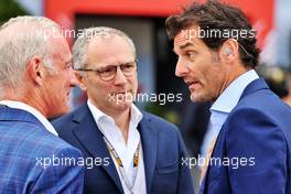 (L to R): Greg Maffei (USA) Liberty Media Corporation President and Chief Executive Officer with Stefano Domenicali (ITA) Formula One President and CEO and Mark Webber (AUS) Channel 4 Presenter. 03.07.2022. Formula 1 World Championship, Rd 10, British Grand Prix, Silverstone, England, Race Day.