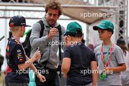 Fernando Alonso (ESP) Alpine F1 Team signs autographs for the fans in the paddock. 30.06.2022. Formula 1 World Championship, Rd 10, British Grand Prix, Silverstone, England, Preparation Day.