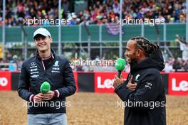 (L to R): George Russell (GBR) Mercedes AMG F1 and Lewis Hamilton (GBR) Mercedes AMG F1. 30.06.2022. Formula 1 World Championship, Rd 10, British Grand Prix, Silverstone, England, Preparation Day.