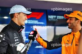 (L to R): George Russell (GBR) Mercedes AMG F1 with Daniel Ricciardo (AUS) McLaren. 30.06.2022. Formula 1 World Championship, Rd 10, British Grand Prix, Silverstone, England, Preparation Day.