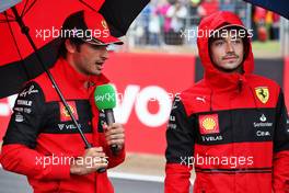 (L to R): Carlos Sainz Jr (ESP) Ferrari with team mate Charles Leclerc (MON) Ferrari.. 30.06.2022. Formula 1 World Championship, Rd 10, British Grand Prix, Silverstone, England, Preparation Day.